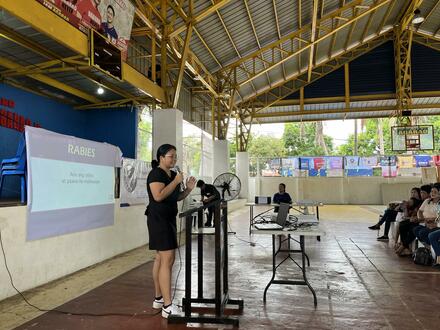 Eunice Mendoza of GARC presents on rabies education, Philippines.
