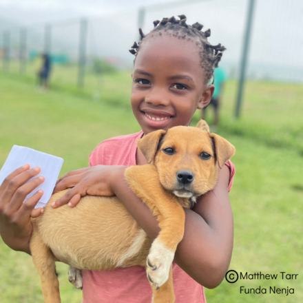 Child with Brown dog, Funda Nenja, South Africa
