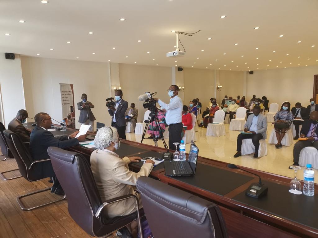 Journalists film as the Minister of Agriculture opens the SARE workshop in Gabon for rabies elimination planning with GARC and FAO