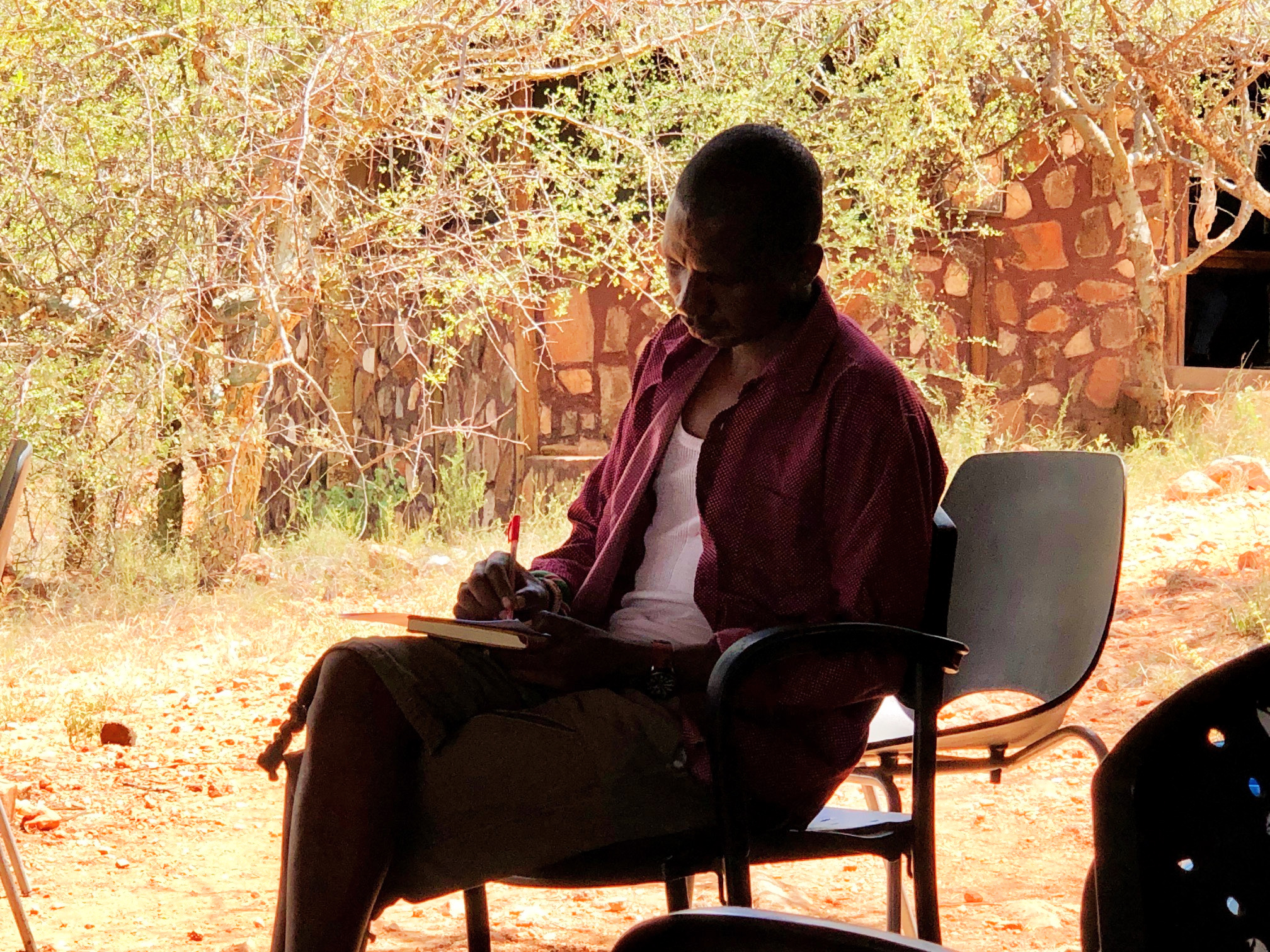 Jeneria from Ewaso Lions sits his assessment for the offline GARC Rabies Educator Certificate (REC) course. 