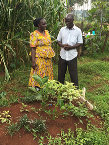 Agnes Korir (Mama Sharon) shares her story with a fellow Kenyan, who also lost a child to rabies. (Source: Sharon Live On Foundation )